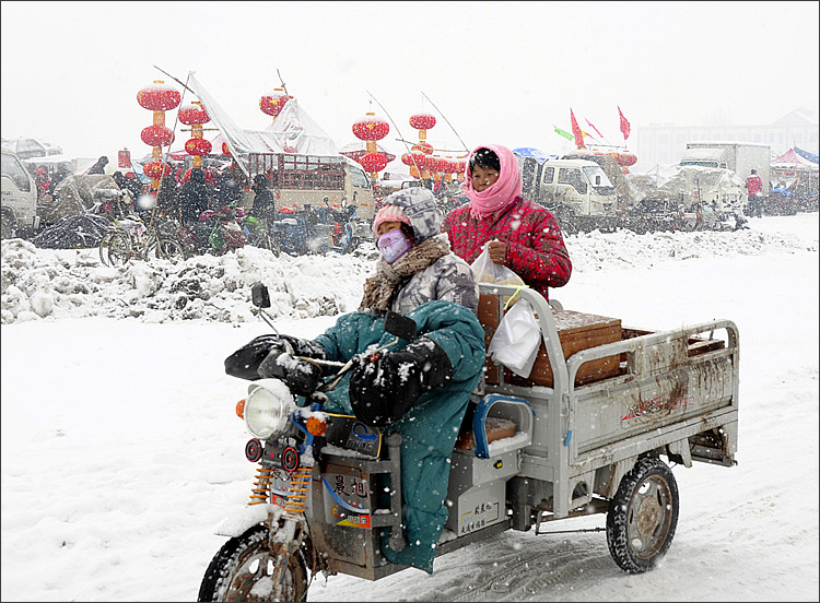 风雪兼程忙备年