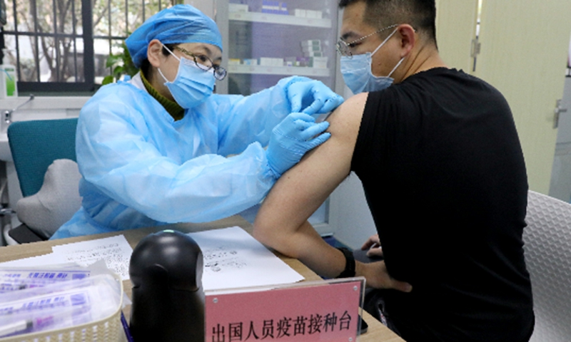 A resident receives a COVID-19 vaccine for emergency use in Shanghai. Photo: Yang Hui/GT