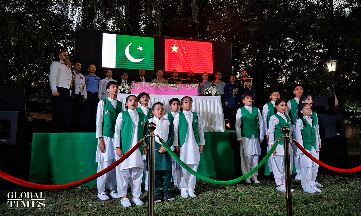 Children sing songs during the celebration of the Pakistan Defence and Martyrs Day at the Pakistani Embassy in Beijing on Monday. Photo: Li Hao/GT